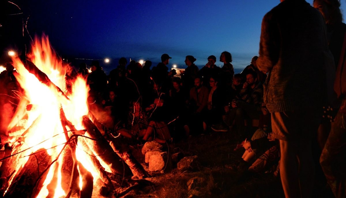 around the campfire at night